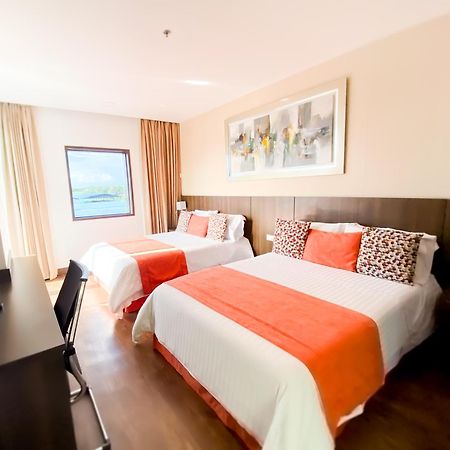 Hotel Royal Elim International Cali Exterior foto A room at the hotel