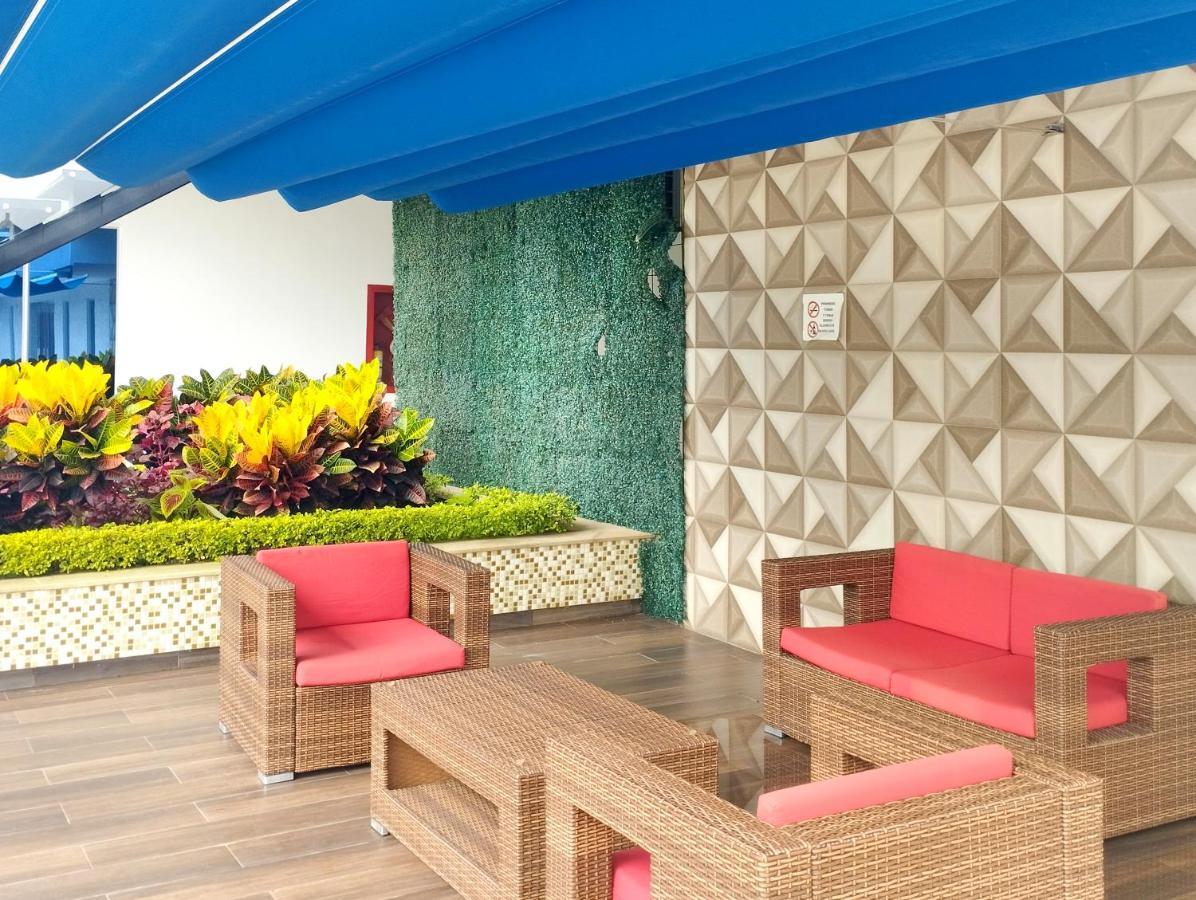 Hotel Royal Elim International Cali Exterior foto The Sky Lounge