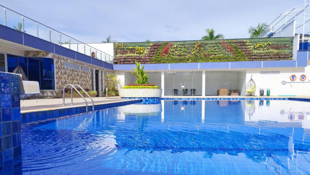 Hotel Royal Elim International Cali Exterior foto The swimming pool at the hotel