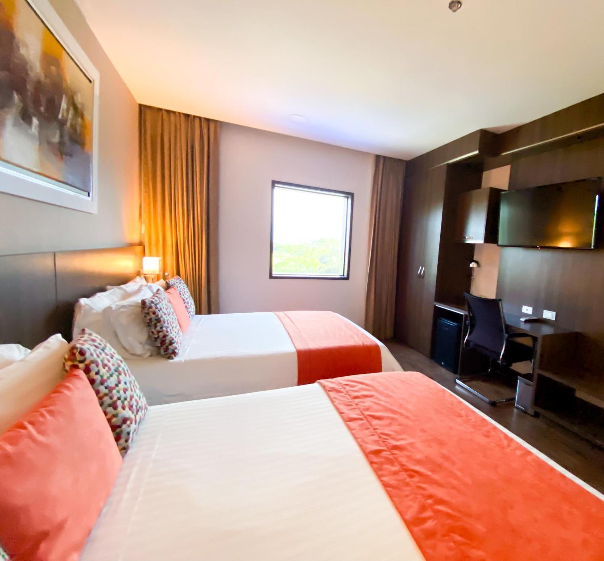 Hotel Royal Elim International Cali Exterior foto A room at the hotel