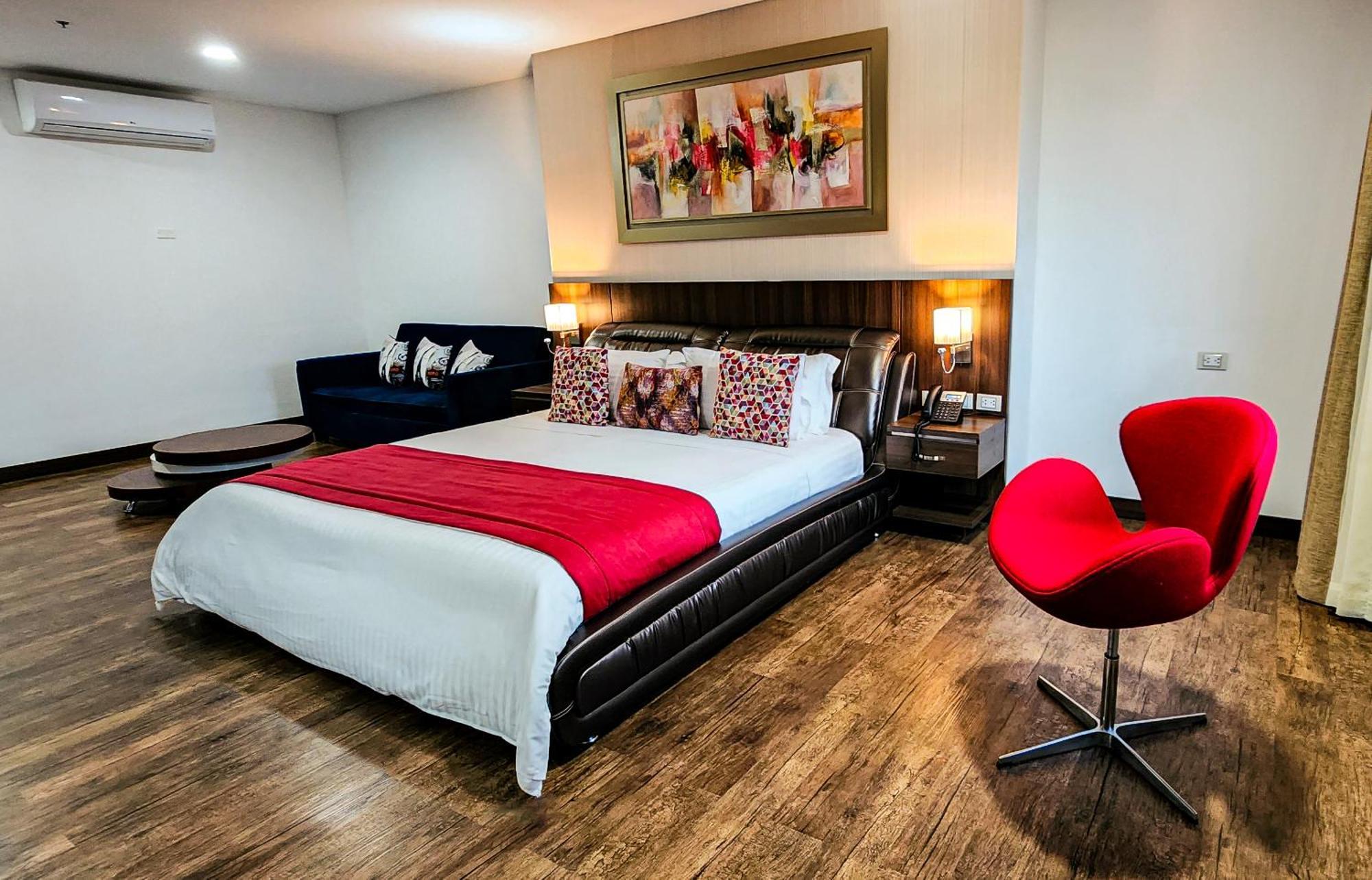 Hotel Royal Elim International Cali Exterior foto A bedroom at the hotel