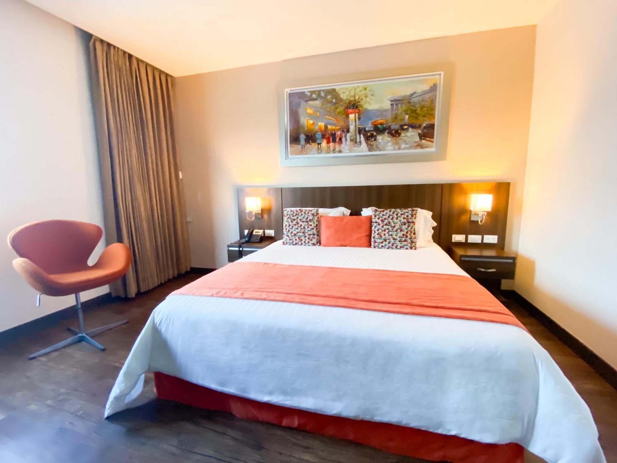 Hotel Royal Elim International Cali Exterior foto A room at the hotel
