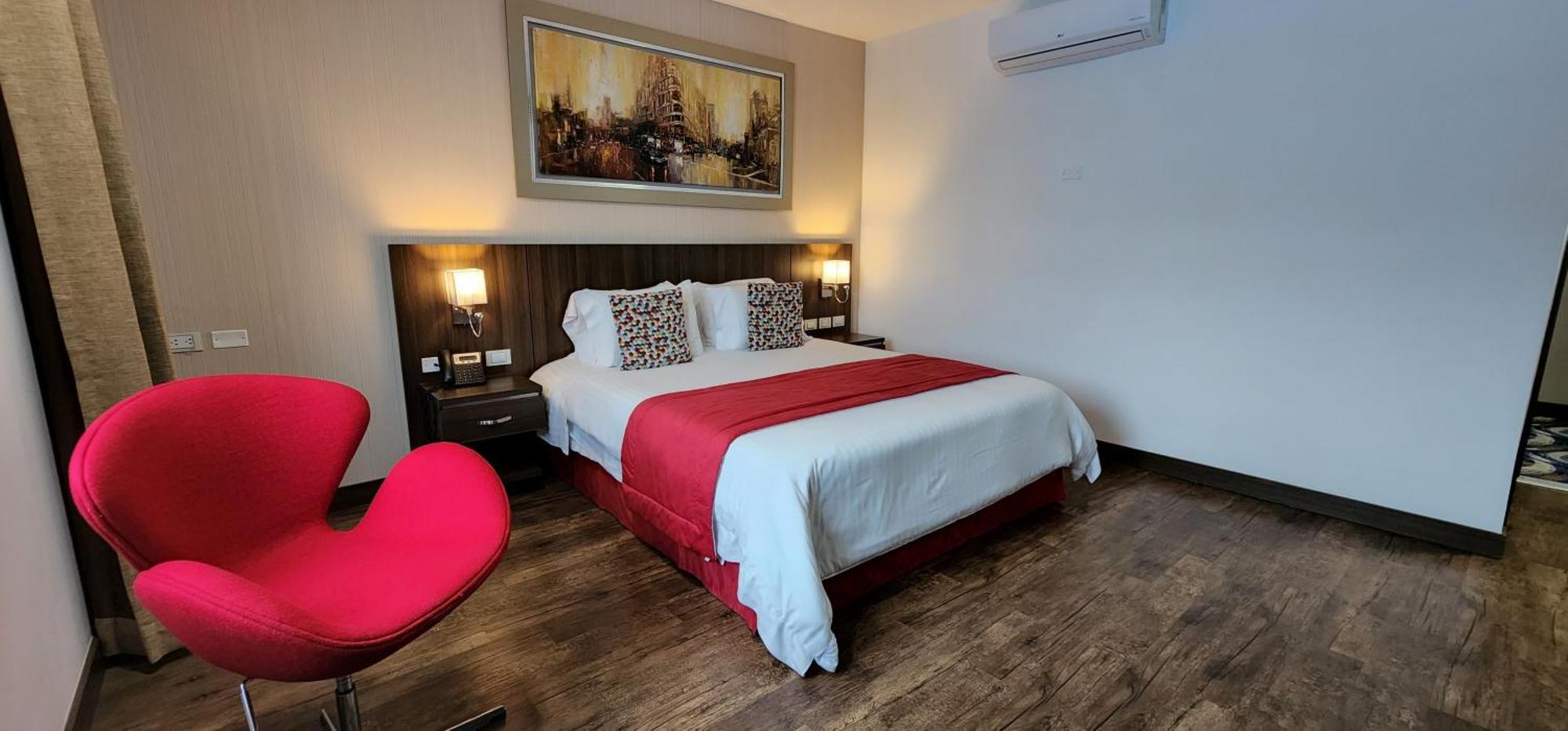 Hotel Royal Elim International Cali Exterior foto A room at the hotel