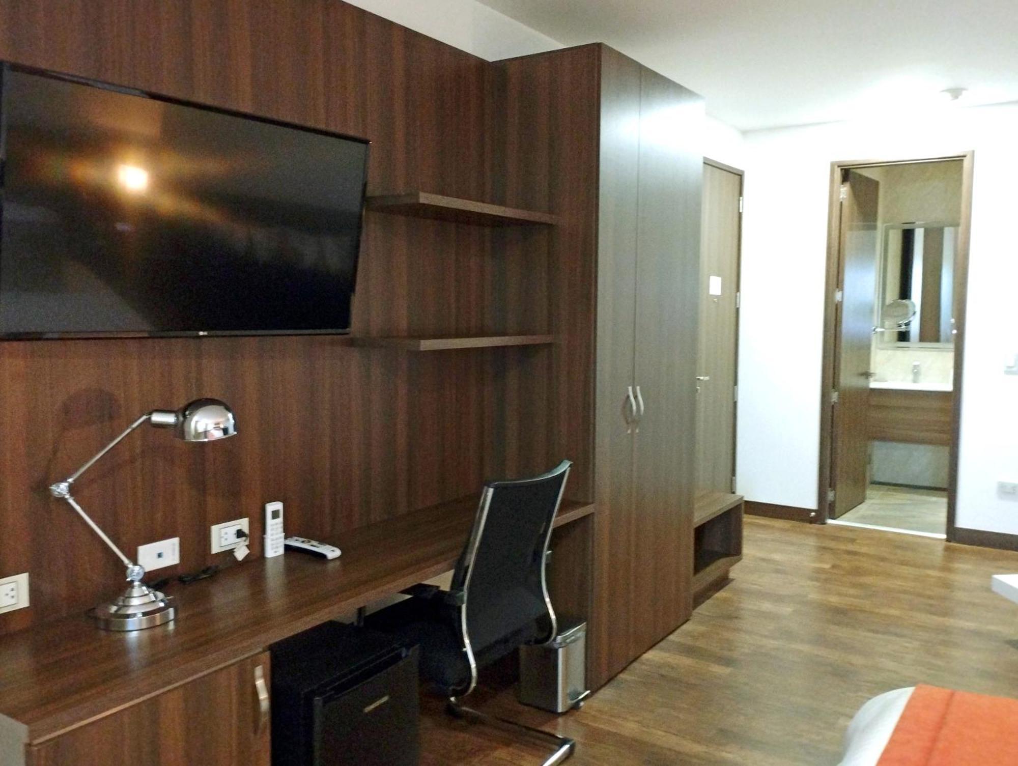 Hotel Royal Elim International Cali Exterior foto A typical bedroom in the halls of residence