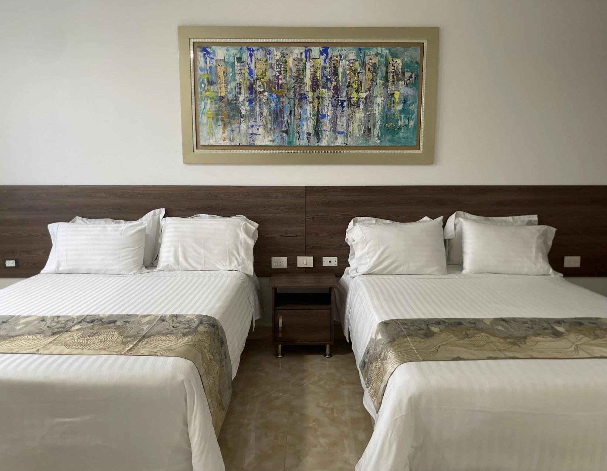 Hotel Royal Elim International Cali Exterior foto A room at the hotel